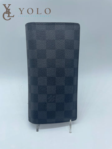 Luxury Market Consignment Boutique - Louis Vuitton Portefeuille Lock Mini  Wallet just in! Like new condition. See details on website.   mini-wallet-f108d