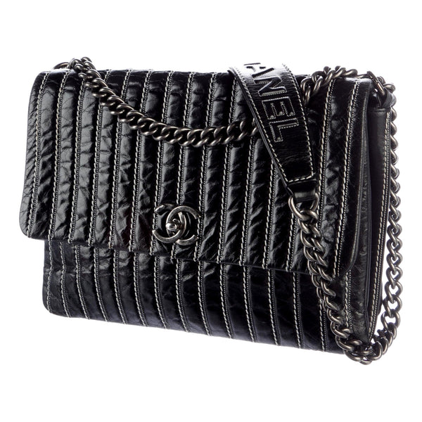 Chanel Black Vertical Stitch Flap Bag CC Logo Silver Chain Shoulder Bag in Black, authentic pre-loved handbag, image 2
