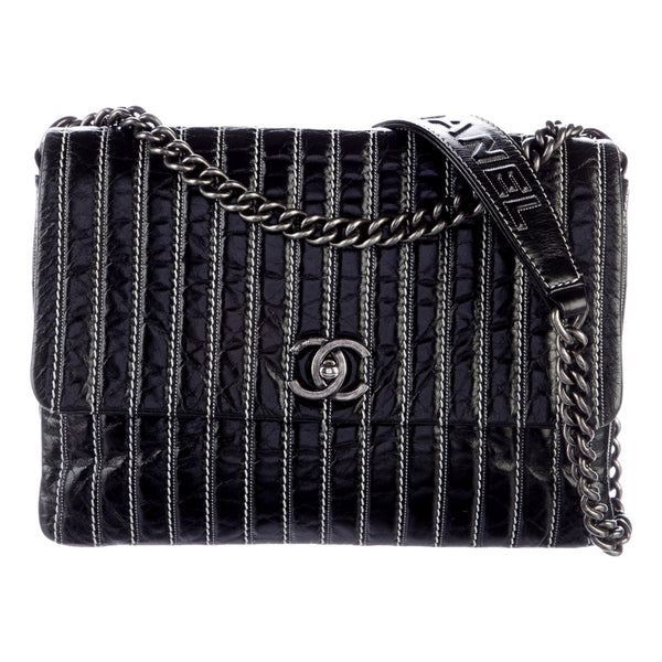 Chanel Black Vertical Stitch Flap Bag CC Logo Silver Chain Shoulder Bag in Black, authentic pre-loved handbag, image 1