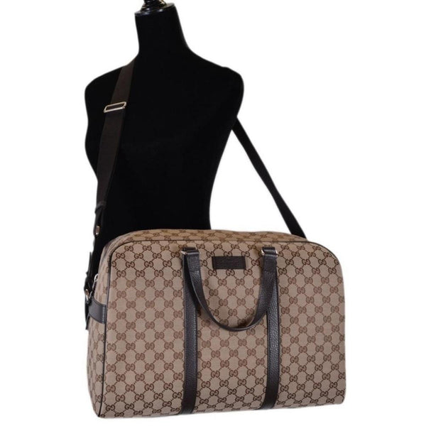 Gucci Large GG Logo Beige Canvas Brown Leather Strap Duffle Bag in Beige and Brown, authentic new handbag, image 2