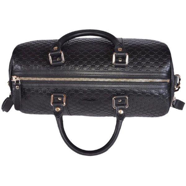Gucci Microguccissima GG Boston Bag Black Embossed Leather Gold Hardware in Black, authentic new handbag, image 4