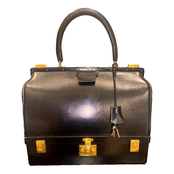 Hermès vintage Sac Mallette vanity trunk top handle bag, front view with the included keys