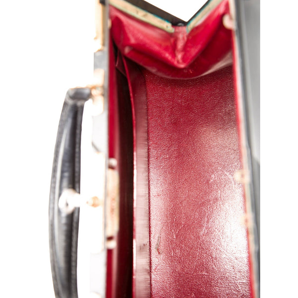 Hermès vintage Sac Mallette vanity trunk top handle bag, view of the chèvre goatskin interior and pockets