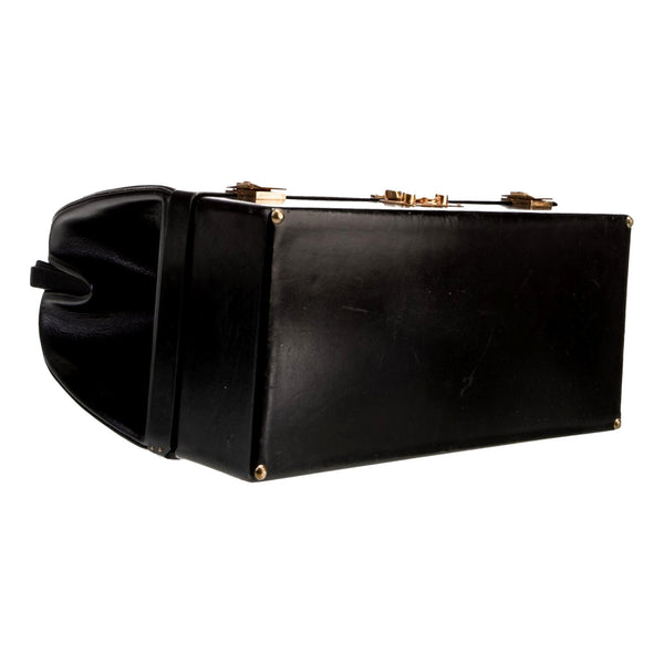 Hermès vintage Sac Mallette vanity trunk top handle bag, side profile showing the structured trunk shape