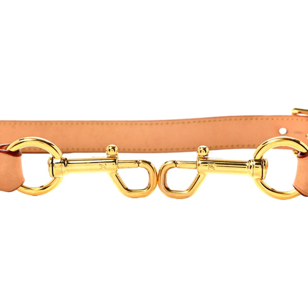 Gold-tone metal clasp attachments on the Louis Vuitton 25mm Vachetta leather shoulder strap