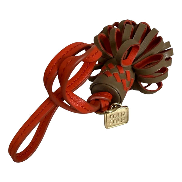 Miu Miu Trick Nappa Leather Pompom Bag Charm Brown and Orange in Cognac Brown and Orange, authentic new keychain, image 2