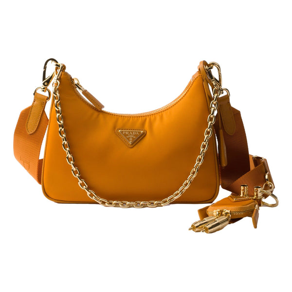 Prada Re-Edition 2005 Orange Re-Nylon and Saffiano Leather Shoulder Bag with Robot Charm Strap – front view