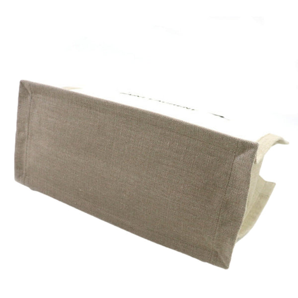 Saint Laurent Rive Gauche Large Tote in Natural Beige Canvas with Black Top Handles – bottom view