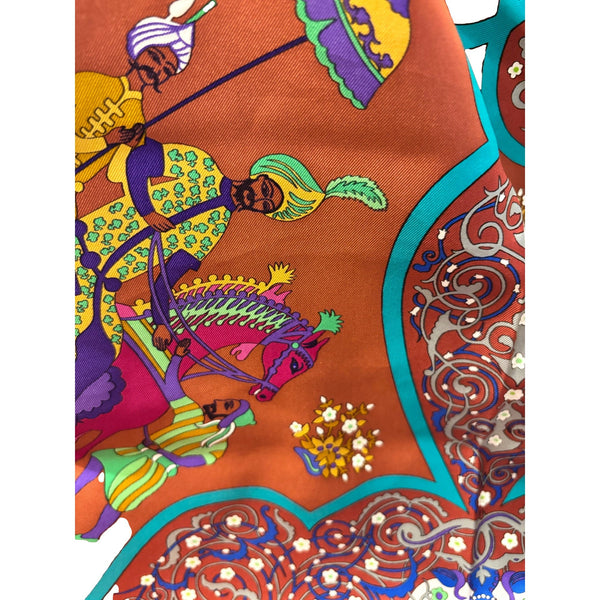 Hermès burgundy silk scarf, close-up of multicolor equestrian artwork