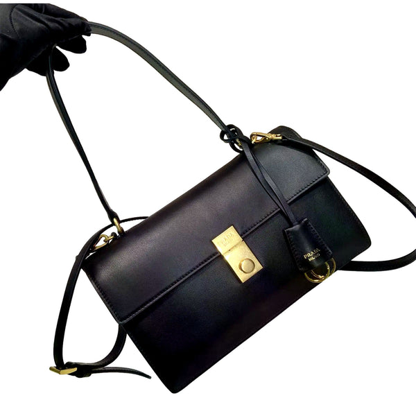 Prada Soft Sound black bag, angled front with detachable strap