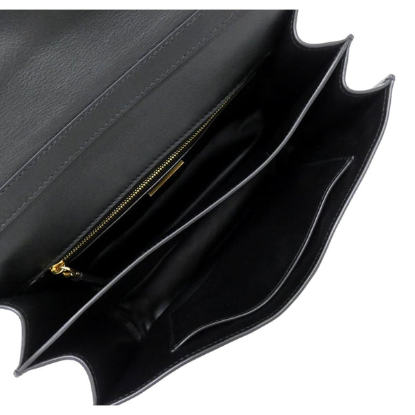 Prada Soft Sound black bag, divided interior and pockets