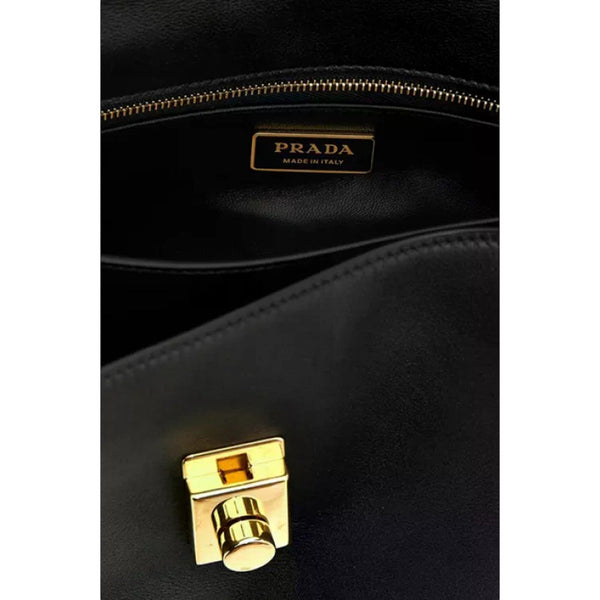 Prada Soft Sound black bag, clasp and interior logo detail